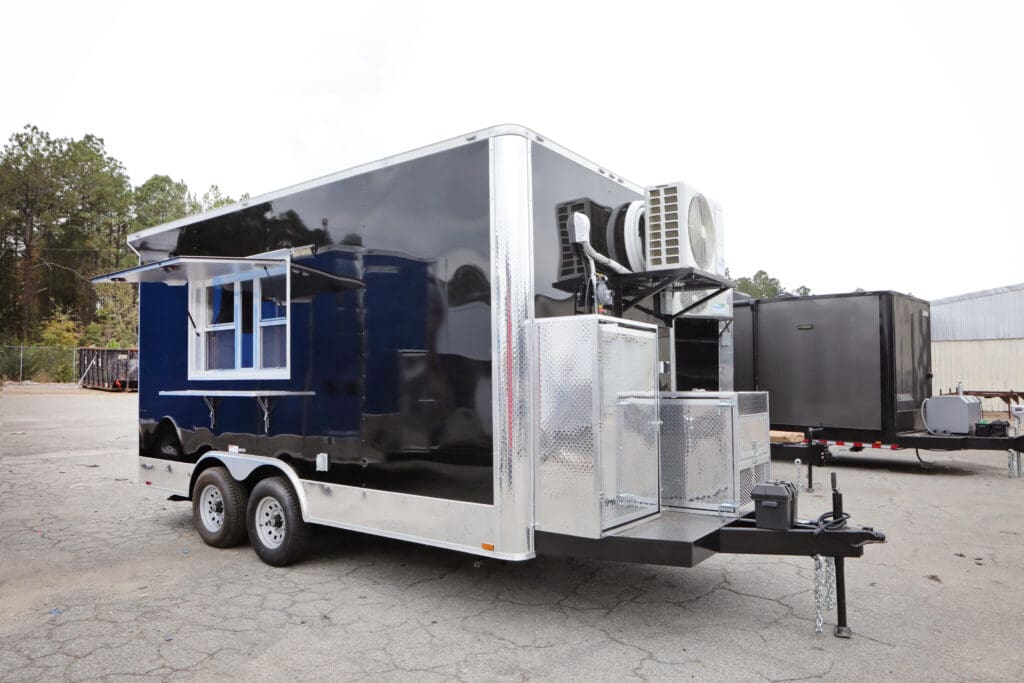 A dark blue concession trailer with a white serving window, featuring a front porch area and a large exhaust fan on the side, designed for vending or catering purposes, possibly a BBQ porch vending trailer